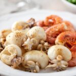 Potato stew with cuttlefish and prawns