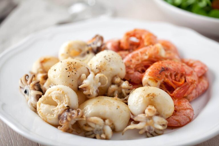 Potato stew with cuttlefish and prawns